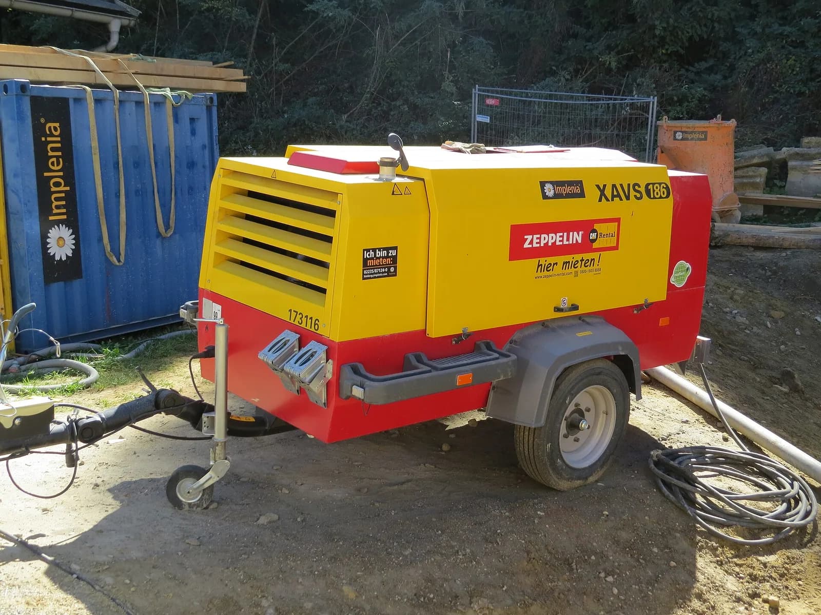 Portable air compressors on a construction site